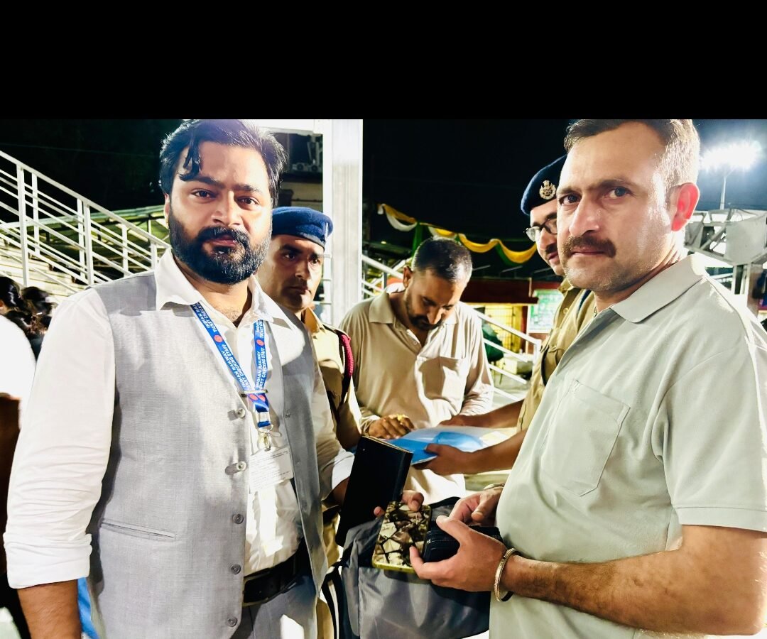 Ticket checking staff returns passenger’s  bag